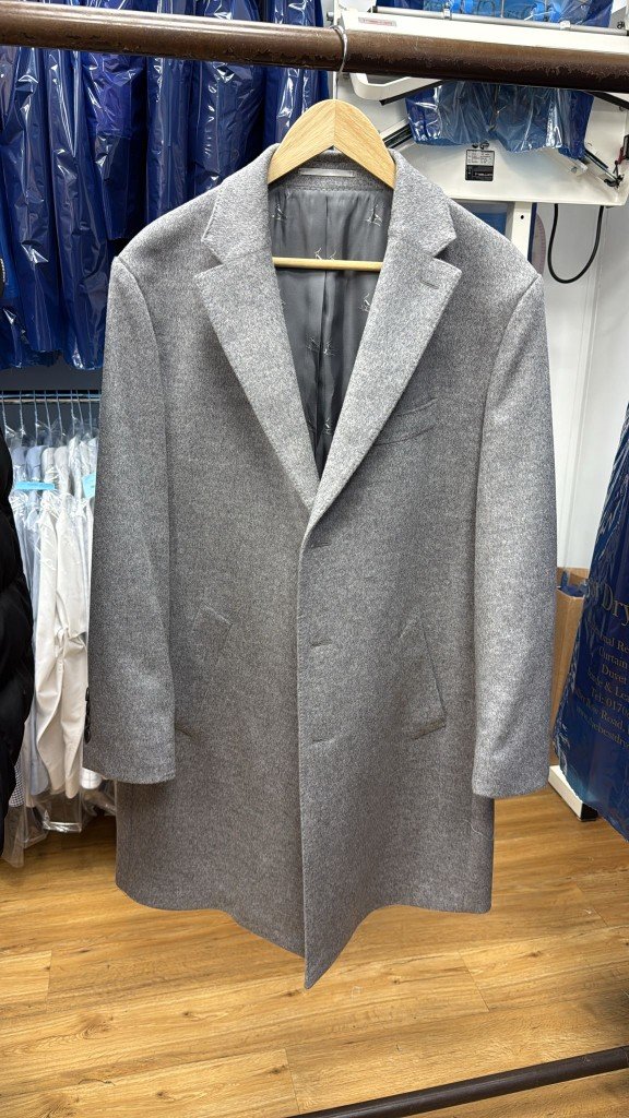 Coat sleeves shortened from the shoulder
